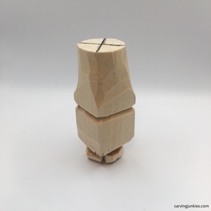 Back view of carved gnome shoes