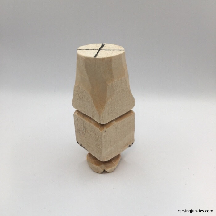 Left view of carved gnome shoes