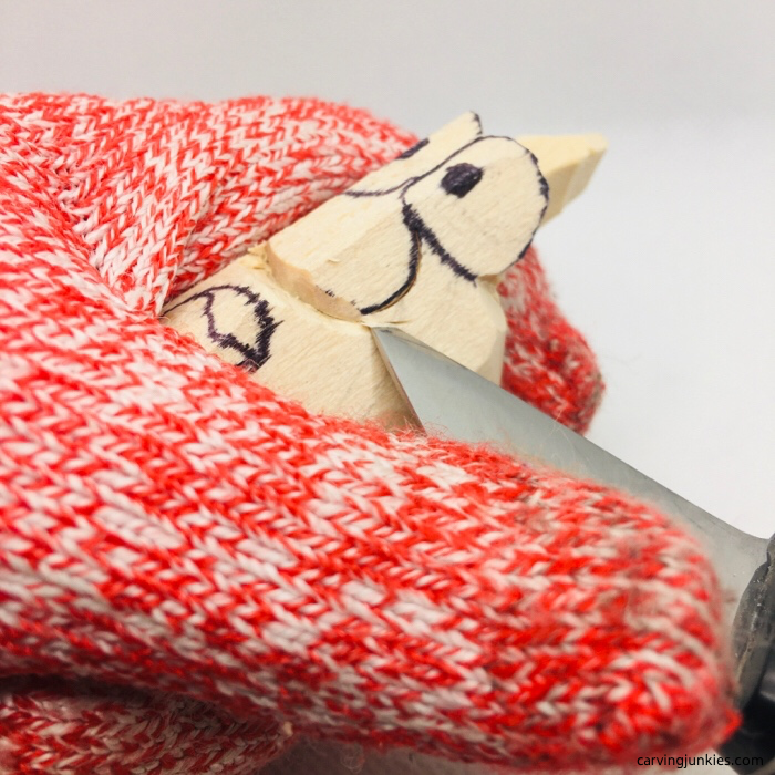 Helvie knife cutting wood