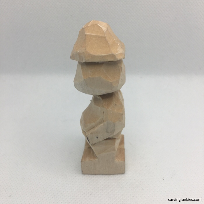 Head turned on caricature carving