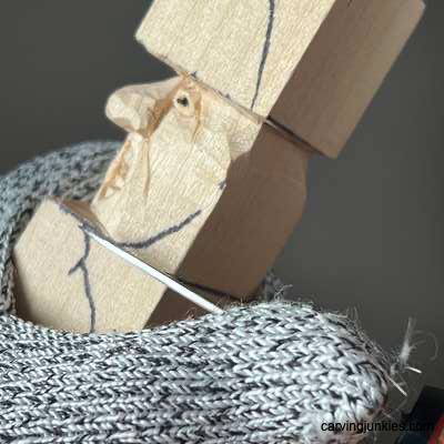 Shaping bottom of wood carved acorn