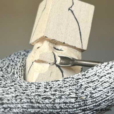 Using micro U-gouge on acorn wood carving