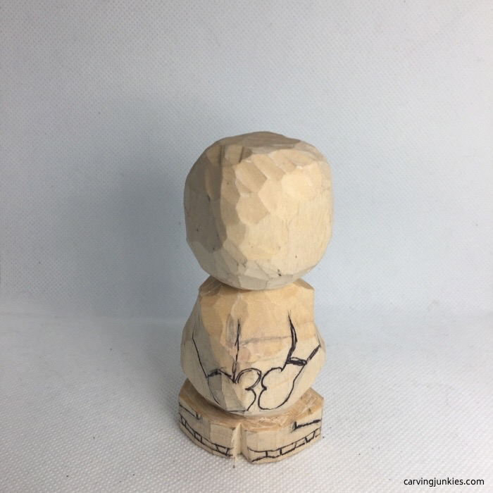 Drawn guidelines for wooden snowman mittens