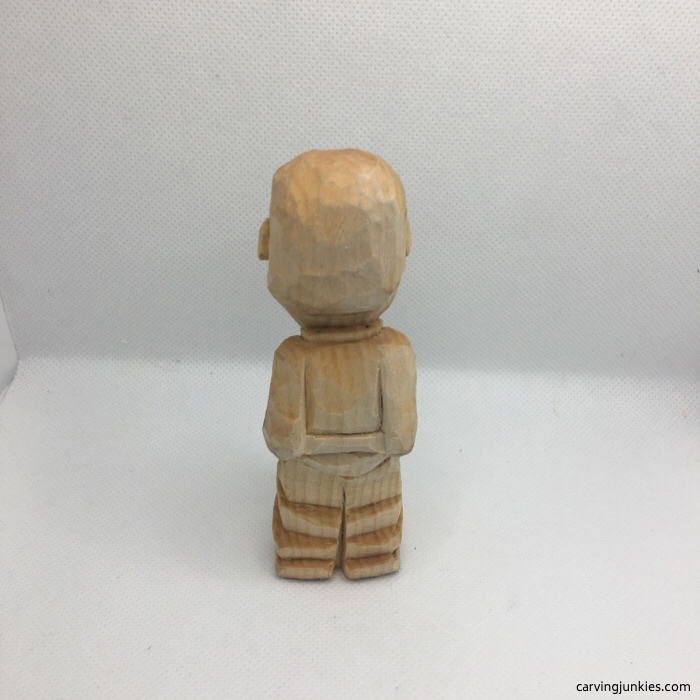 Back of carved caricature