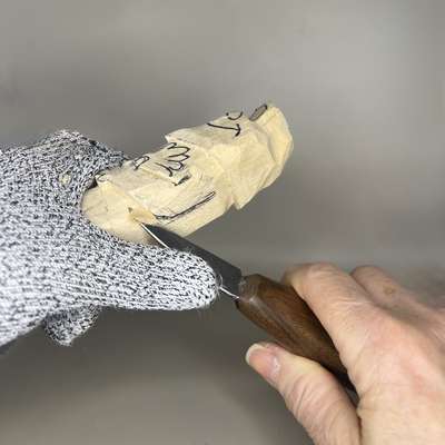 Separating the arms on wood carving