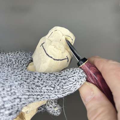 Carving eyes on Bigfoot