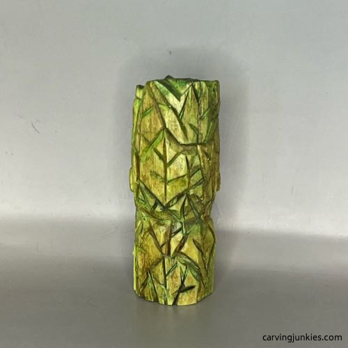 Back view of wood carved green man