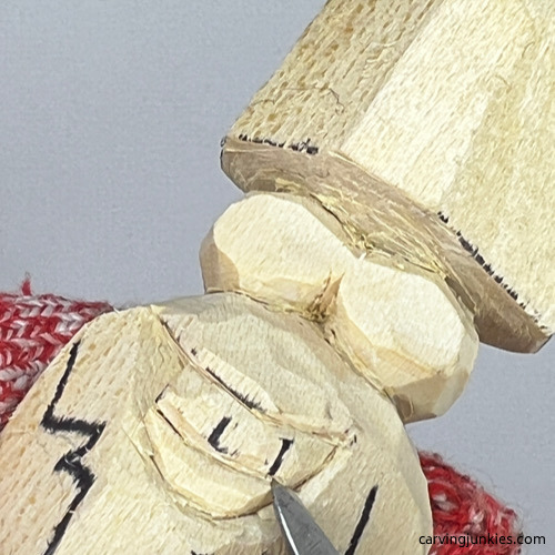 Refining teeth on carved monster toothpick holder