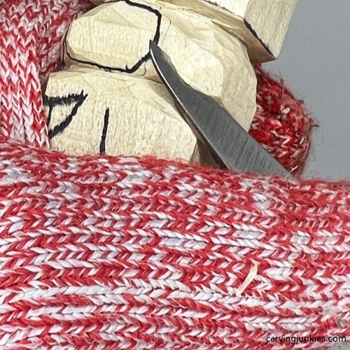 Carving eye on carved monster toothpick holder