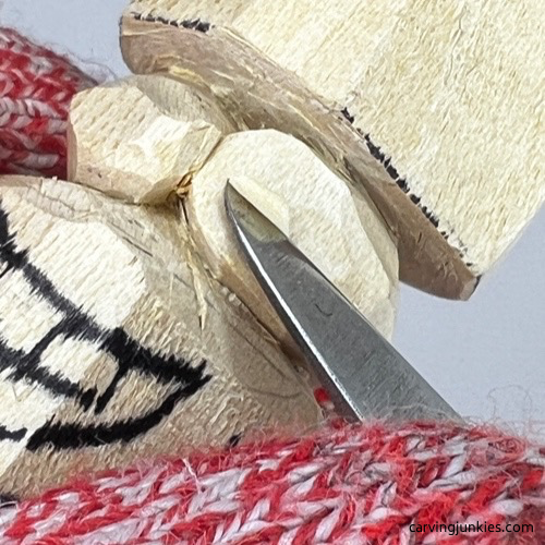 Flattening eyes on carved monster toothpick holder