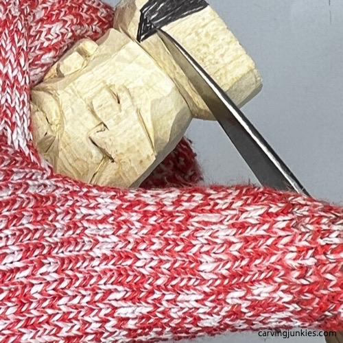 Carving foot on carved monster toothpick holder