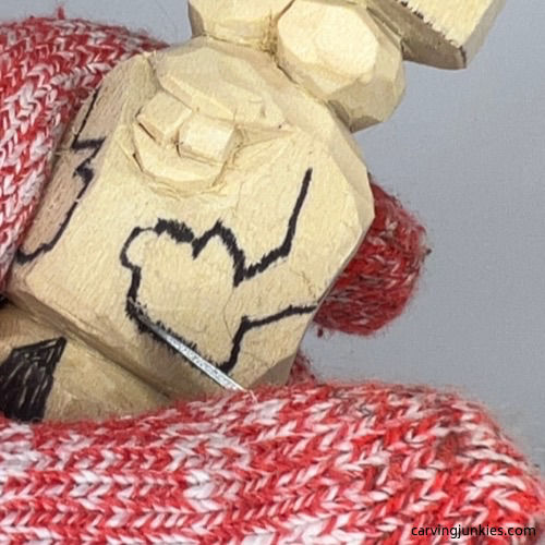 Separating hands on carved monster toothpick holder