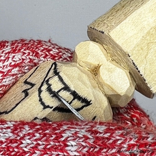 Cutting teeth on carved monster toothpick holder