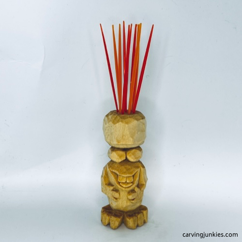 Toothpicks on carved monster toothpick holder