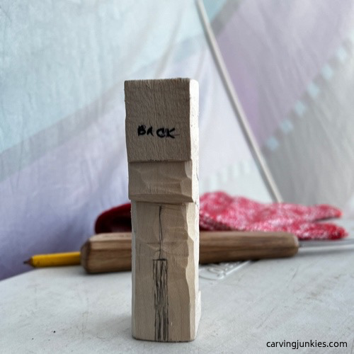 Back leg guideline on carved old man