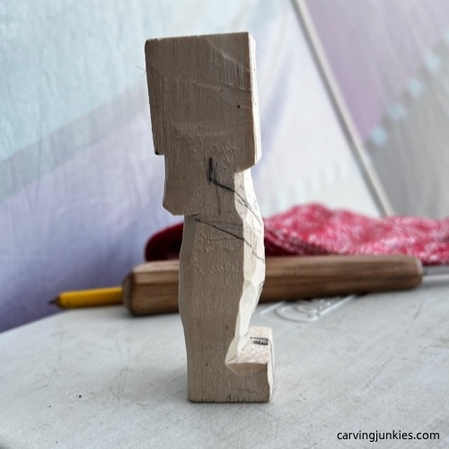 Right arm drawn on carved old man