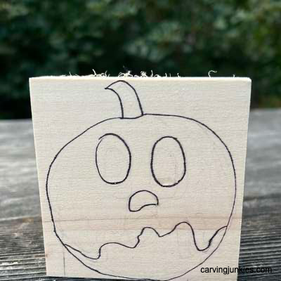 Transform a plain block of wood into a spooky ghost pumpkin