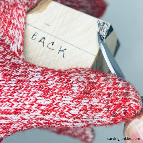 Removing wood off back of wood carved fortune cookie