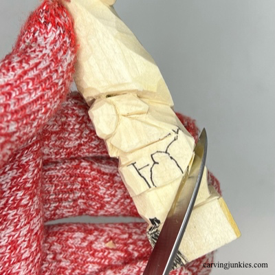 Separating arms on wooden Christmas gnome