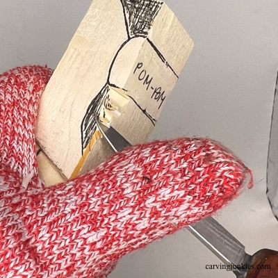 Removing wood from the sides of the wooden Christmas gnome