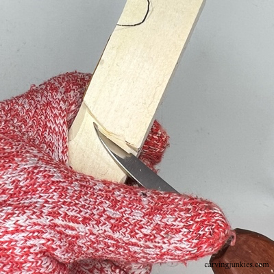 Separating hat on wooden Christmas gnome