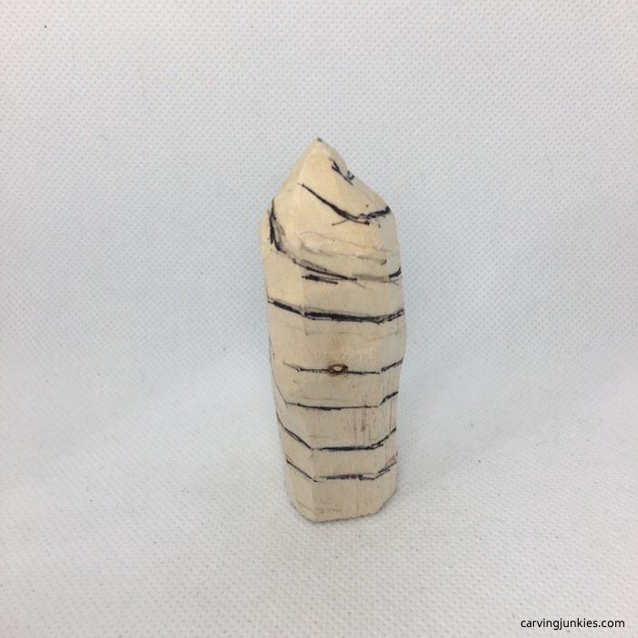 Drawn spiral on wood