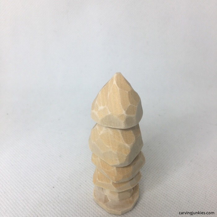 Unpainted wood carved tree