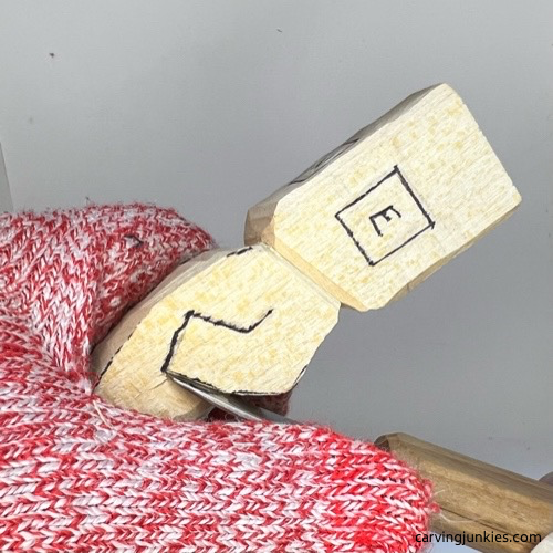 Separating arms on wooden circus clown Carving arms on wood circus clown