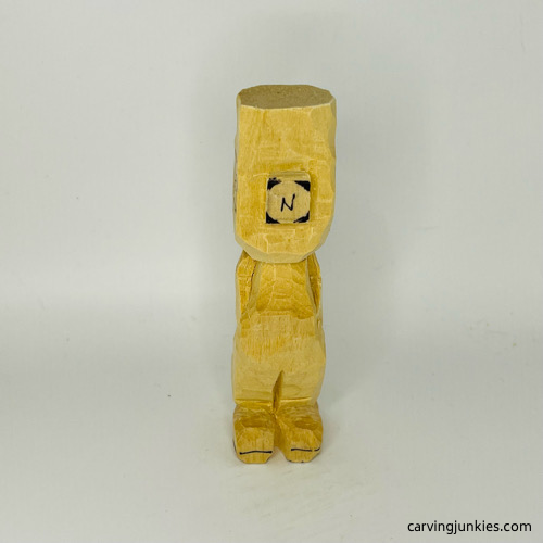 Shaping nose on wooden circus clown Rounding nose on wood circus clown