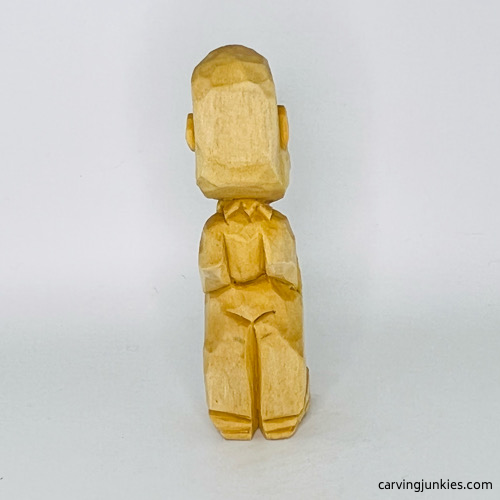 Back side of wooden circus clown unfinished Back view of wood circus clown before painting