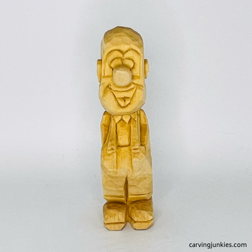 Front side of wooden circus clown unfinished Front view of wood circus clown before painting
