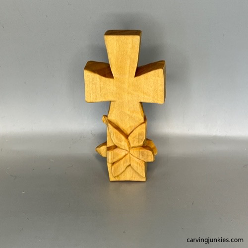 Completed wooden cross carving prior to painting