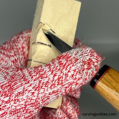 Cutting up to stop cut on green man