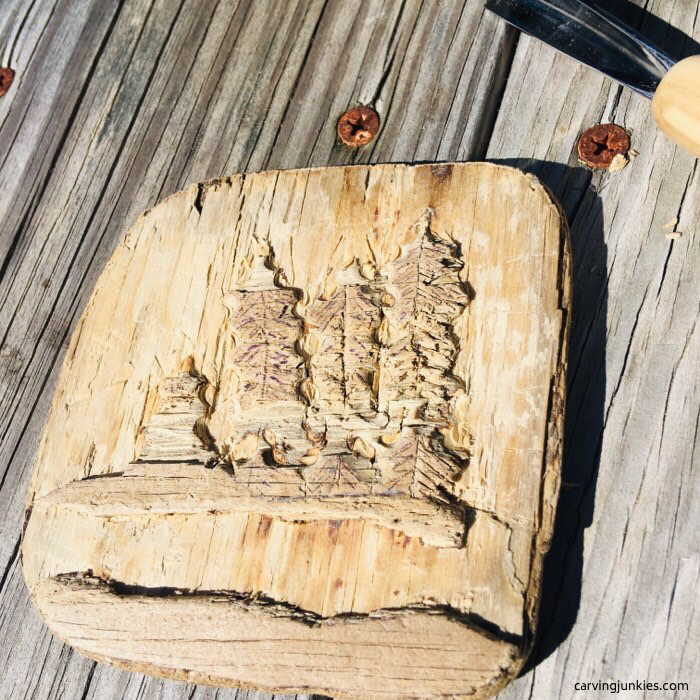 Natural carved relief on wood