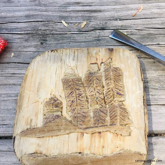 Tree relief carving in driftwood