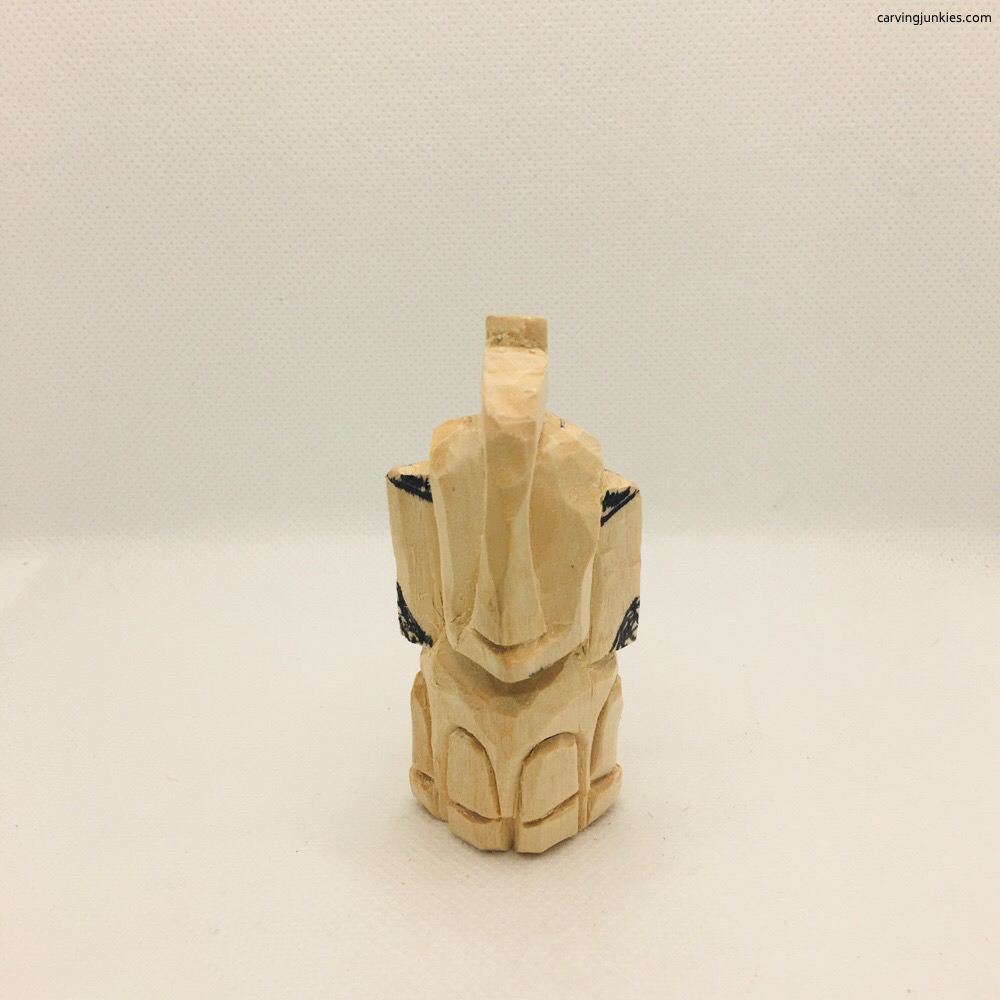 Reducing wood on elephant carving