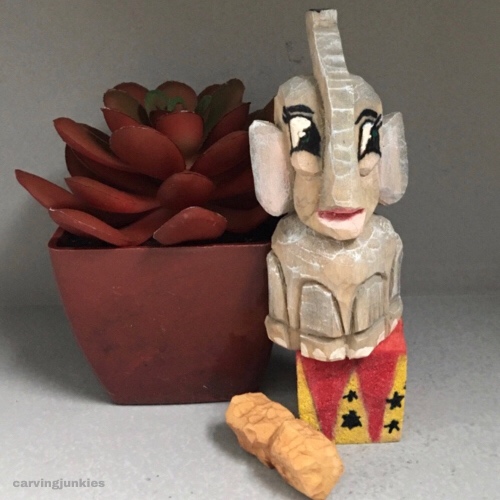 Front view of painted wooden elephant