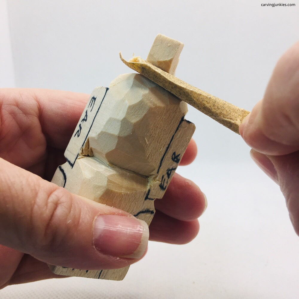 Sanding wood carving