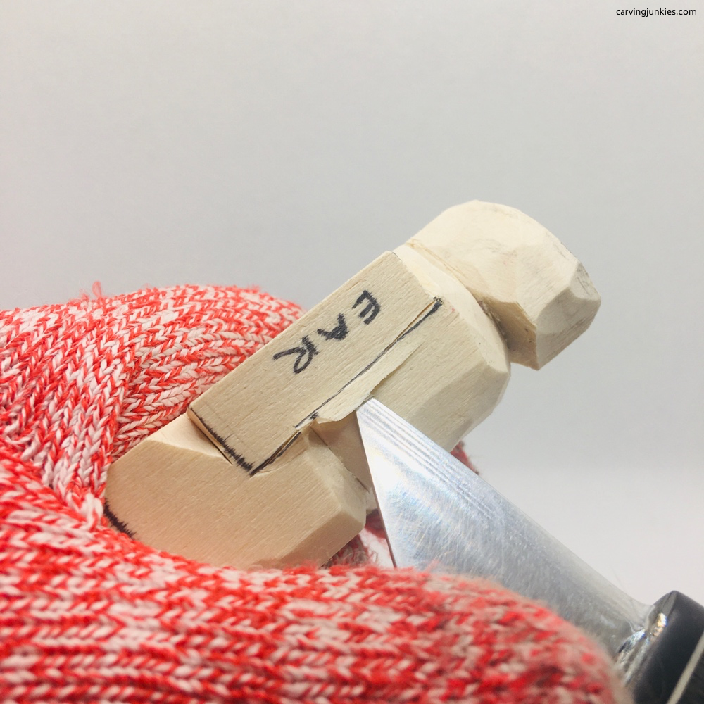 Cutting ears in wood