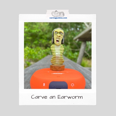 Earworm wood carving