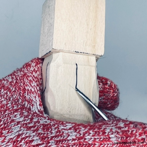 Carving arm on an Easter whittle