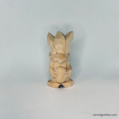 Front paws on Easter whittle