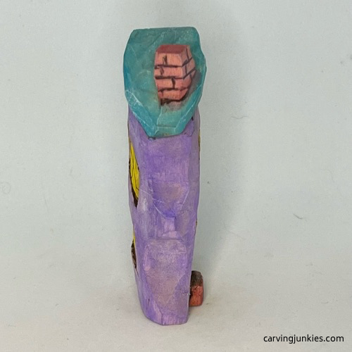 Right view of painted easy whittled house