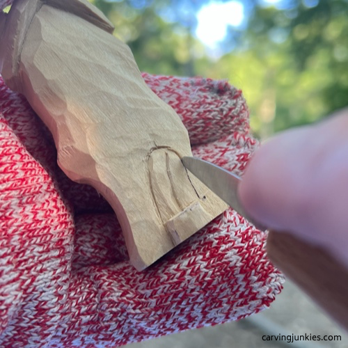 Separating door on easy wood whittled house