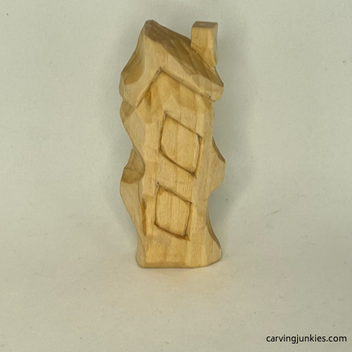 Back view of unpainted easy wood whittled house