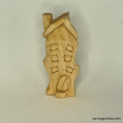 Front of unpainted easy whittled house