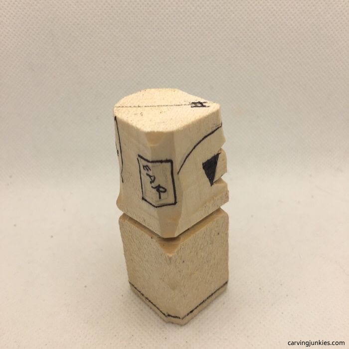 Reserving ear to carve in wood