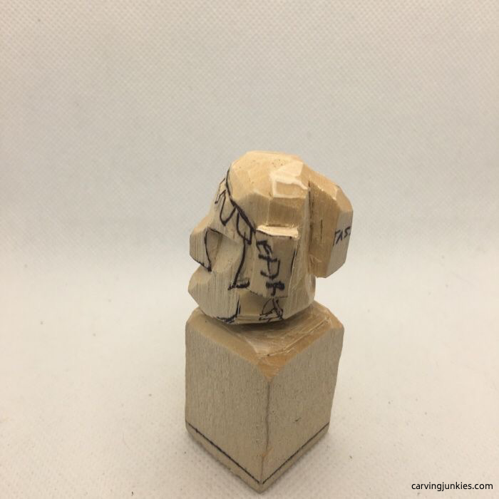 Left view of elf carving