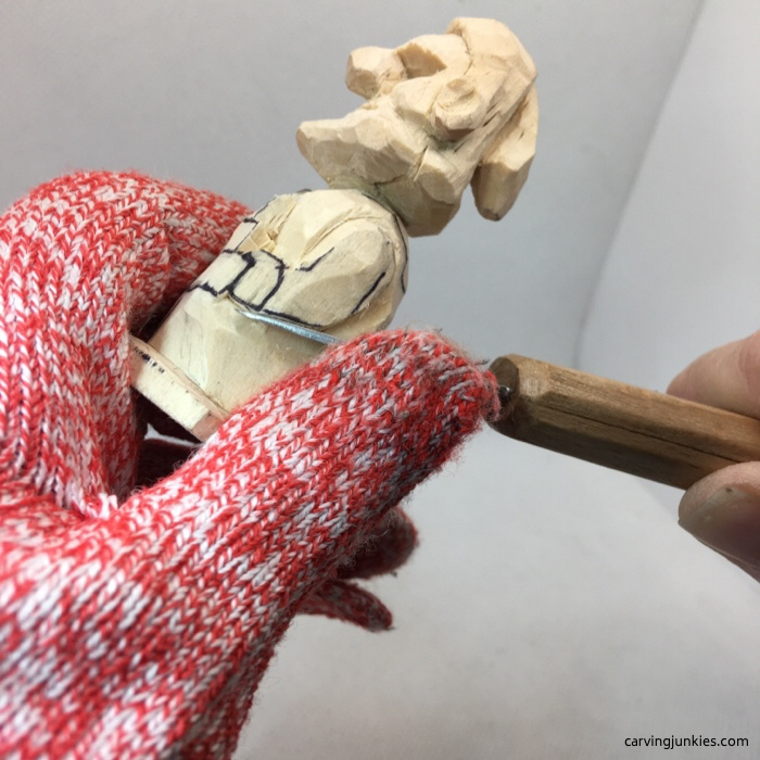 Defining arms on wooden elf