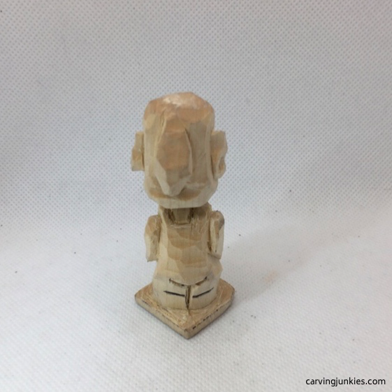 Back of elf carving